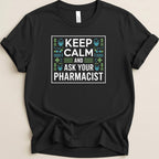 Black t-shirt with white box containing "Keep calm and ask your pharmacist" text.