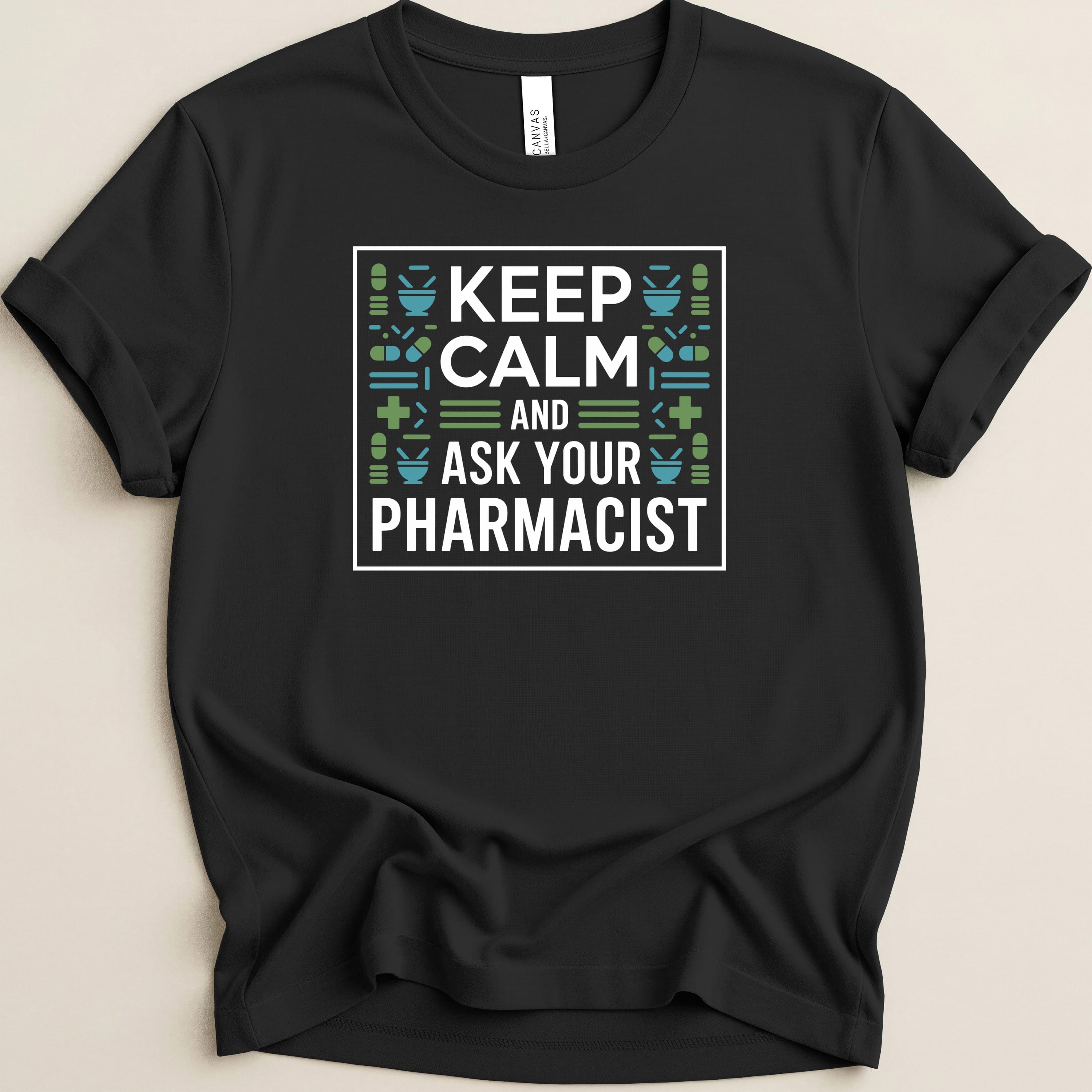 Black t-shirt with white box containing "Keep calm and ask your pharmacist" text.