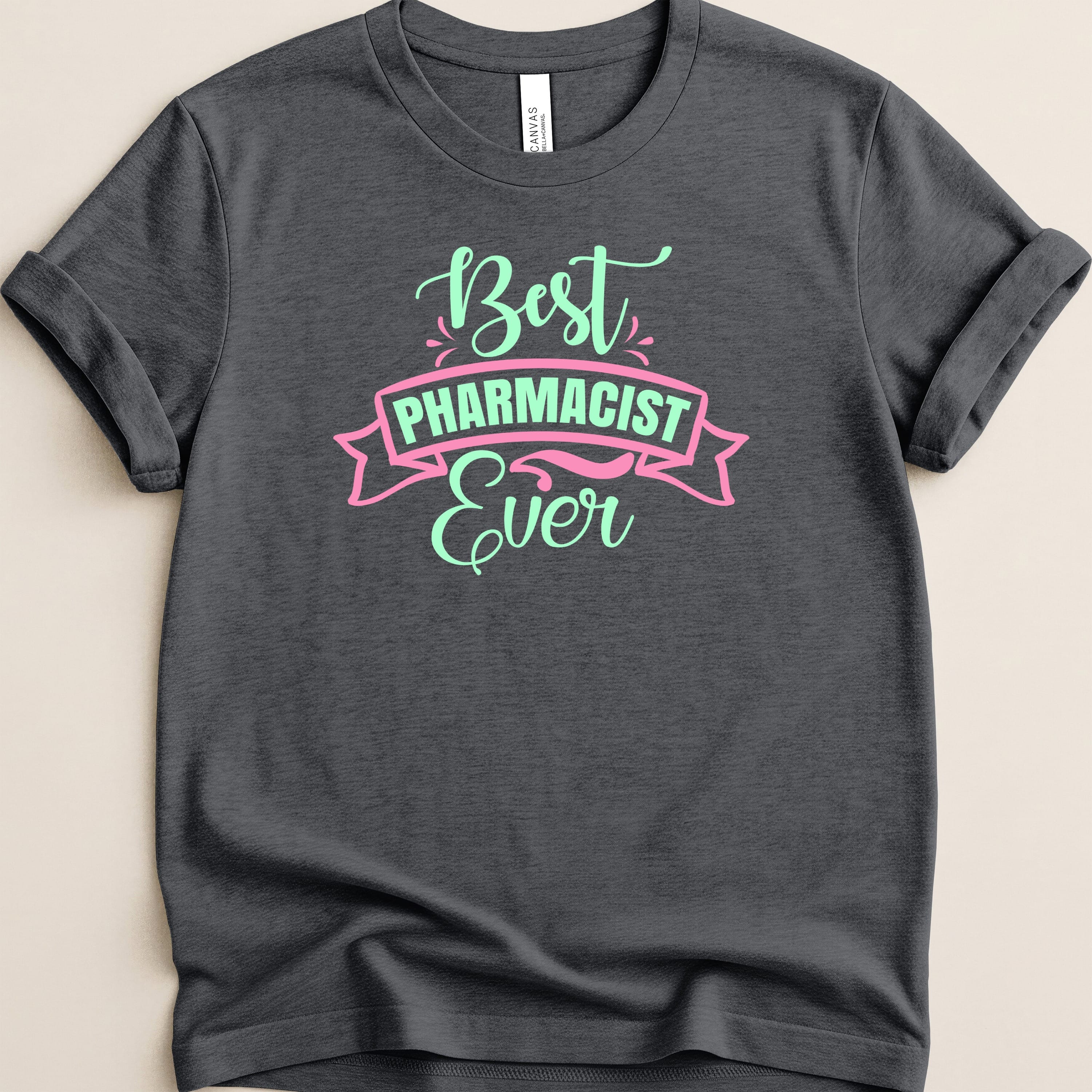 Dark t-shirt with "Best Pharmacist Ever" in teal and pink text.