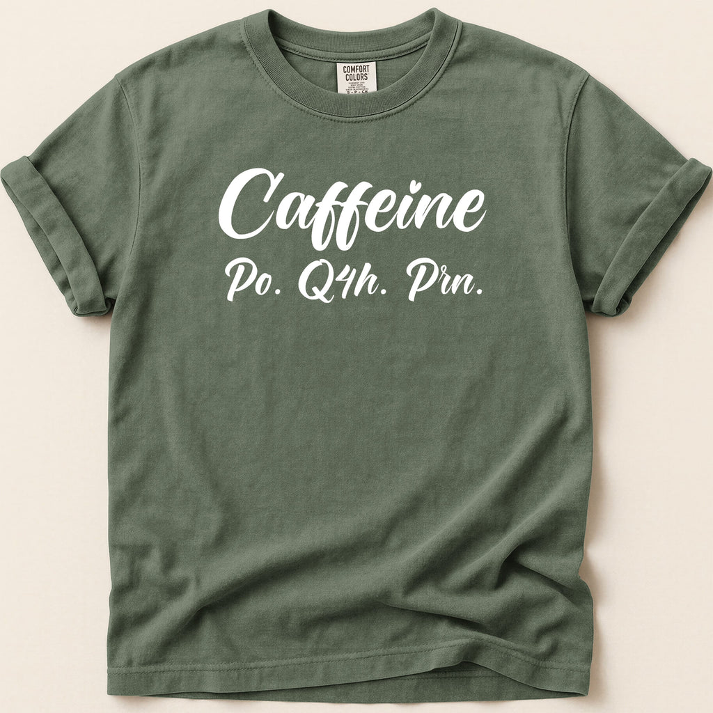 Green t-shirt with "Caffeine Po. Q4h. Prn." text.