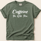 Green t-shirt with "Caffeine Po. Q4h. Prn." text.