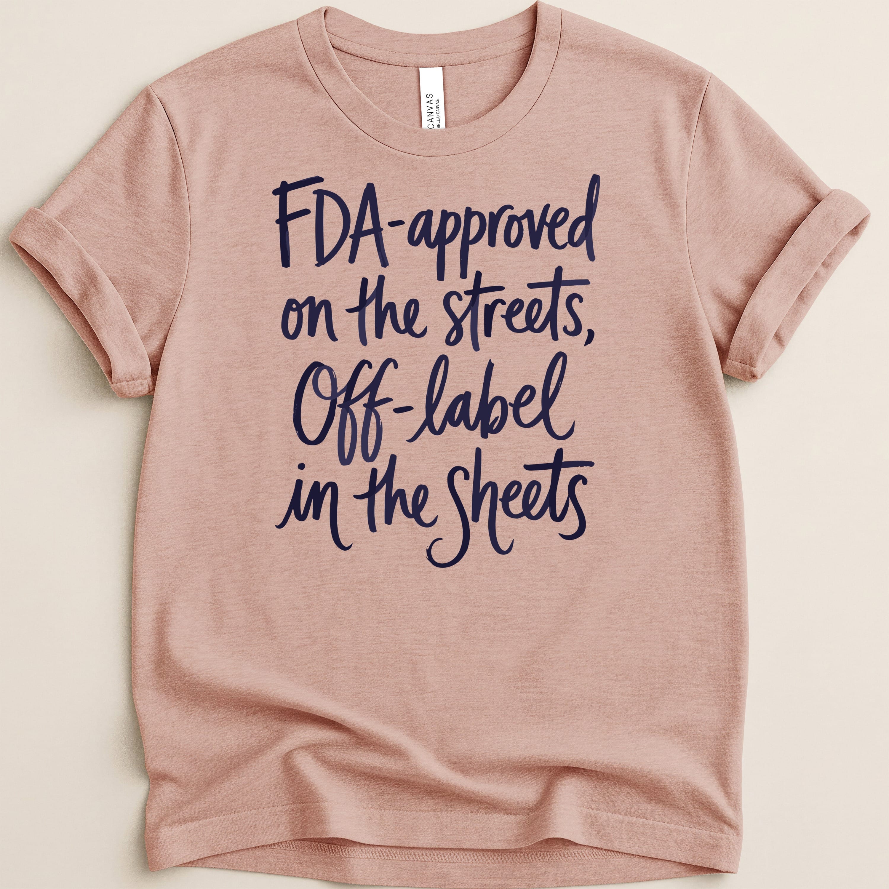 Pink t-shirt with "FDA-approved on the streets, Off-label in the Sheets" text.