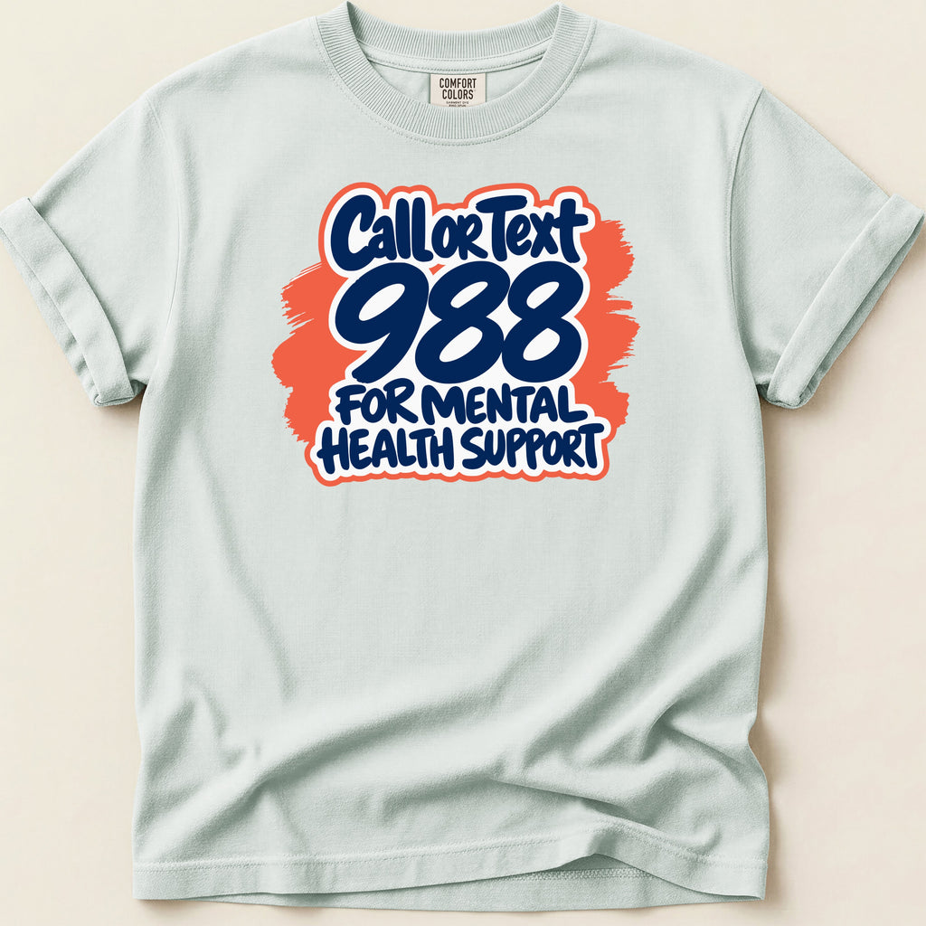 Light blue t-shirt with text "Call or Text 988 for Mental Health Support."