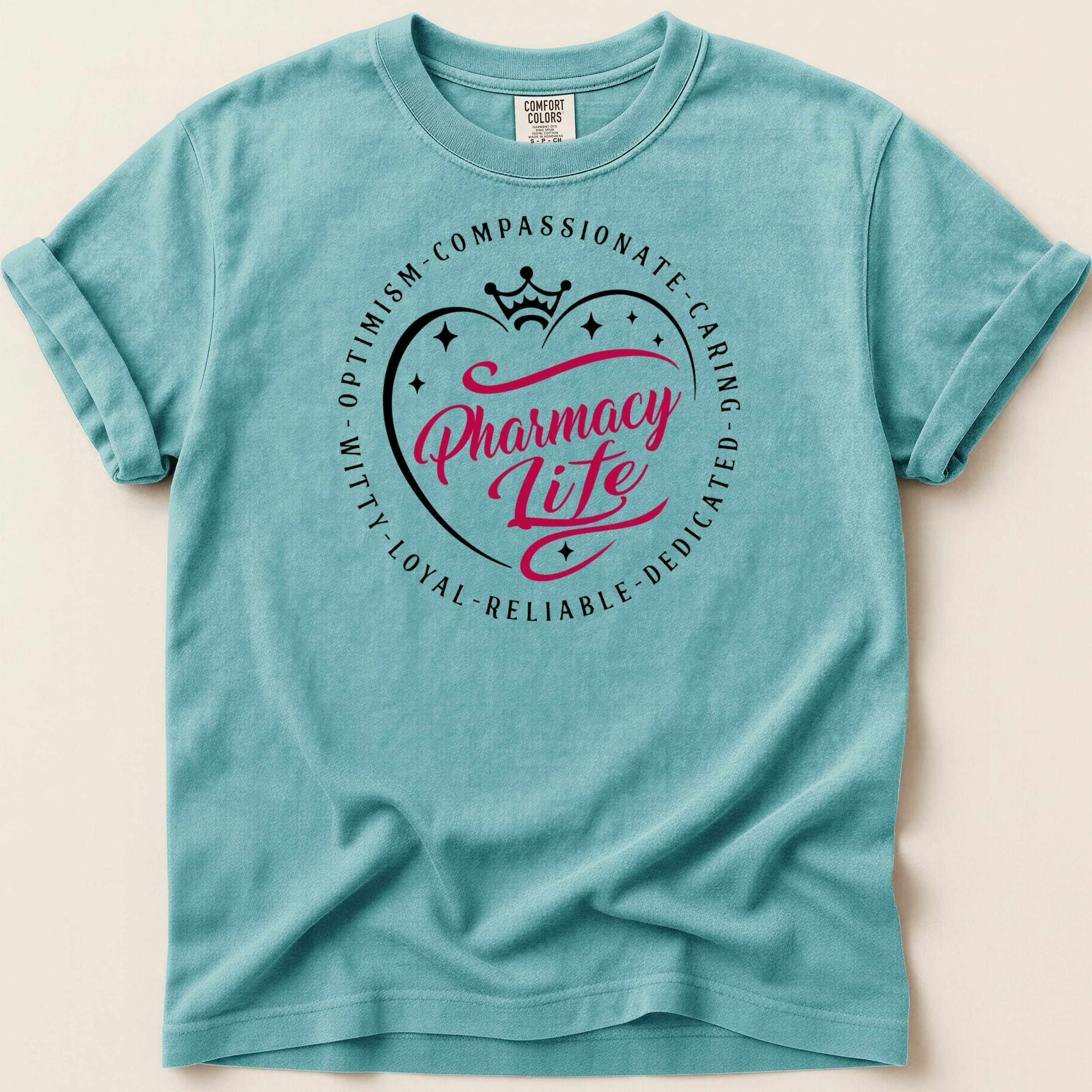 Teal t-shirt with "Pharmacy Life" graphic in pink circle with crown.