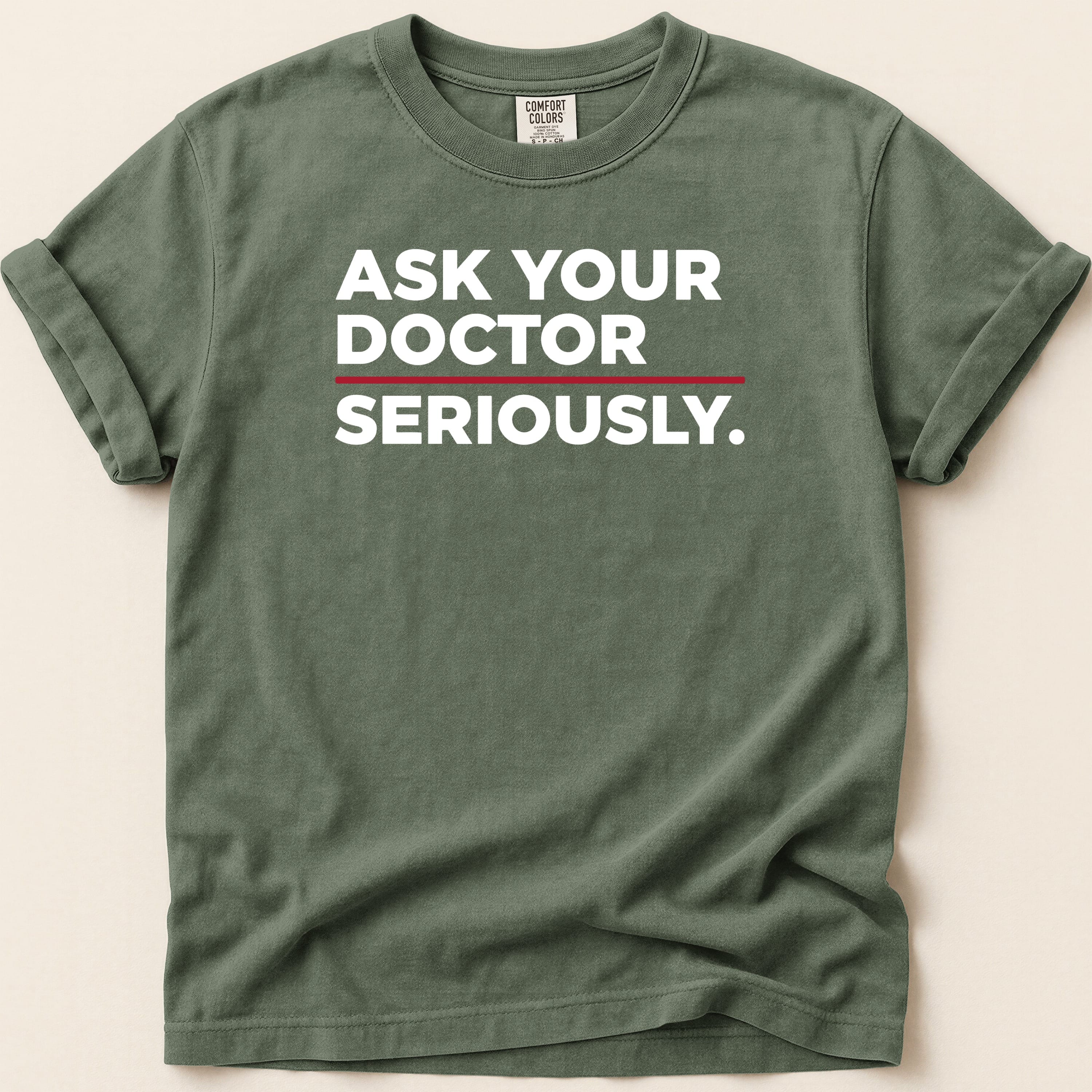 Green t-shirt with white text "ASK YOUR DOCTOR SERIOUSLY."