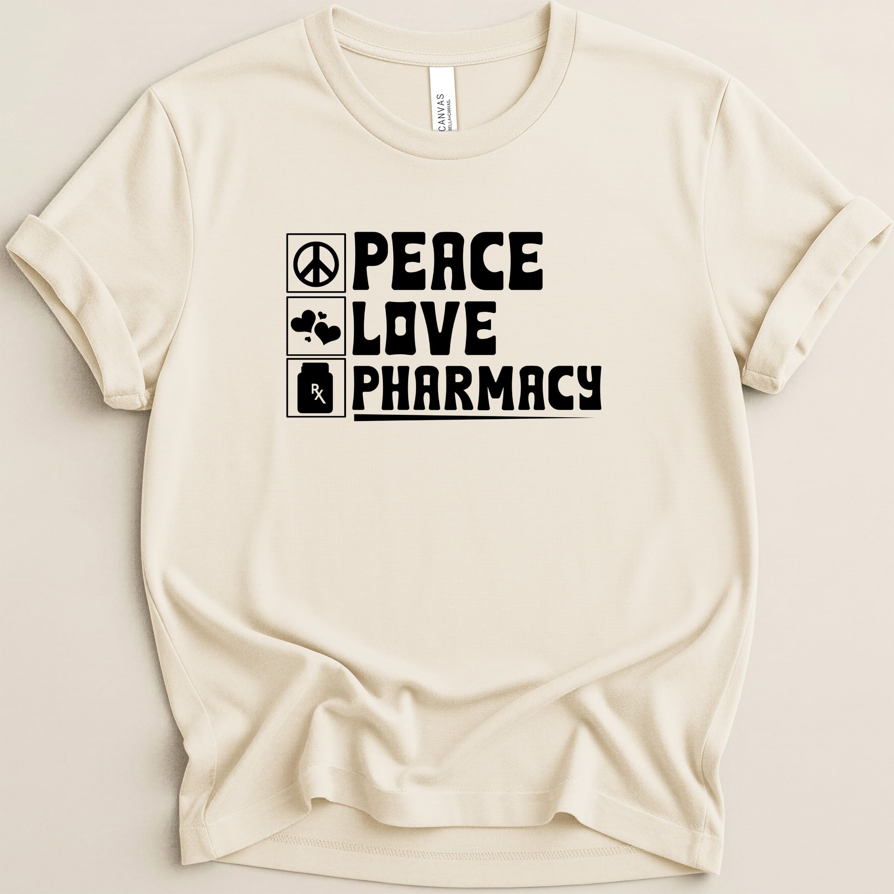 Cream t-shirt with "Peace Love Pharmacy" text and icons.