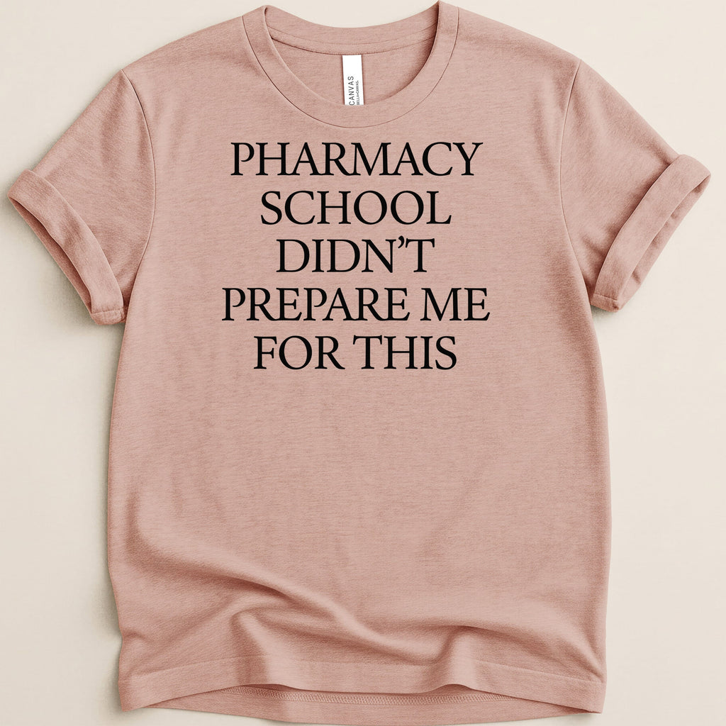 Pink t-shirt with "Pharmacy School Didn't Prepare Me For This" text.