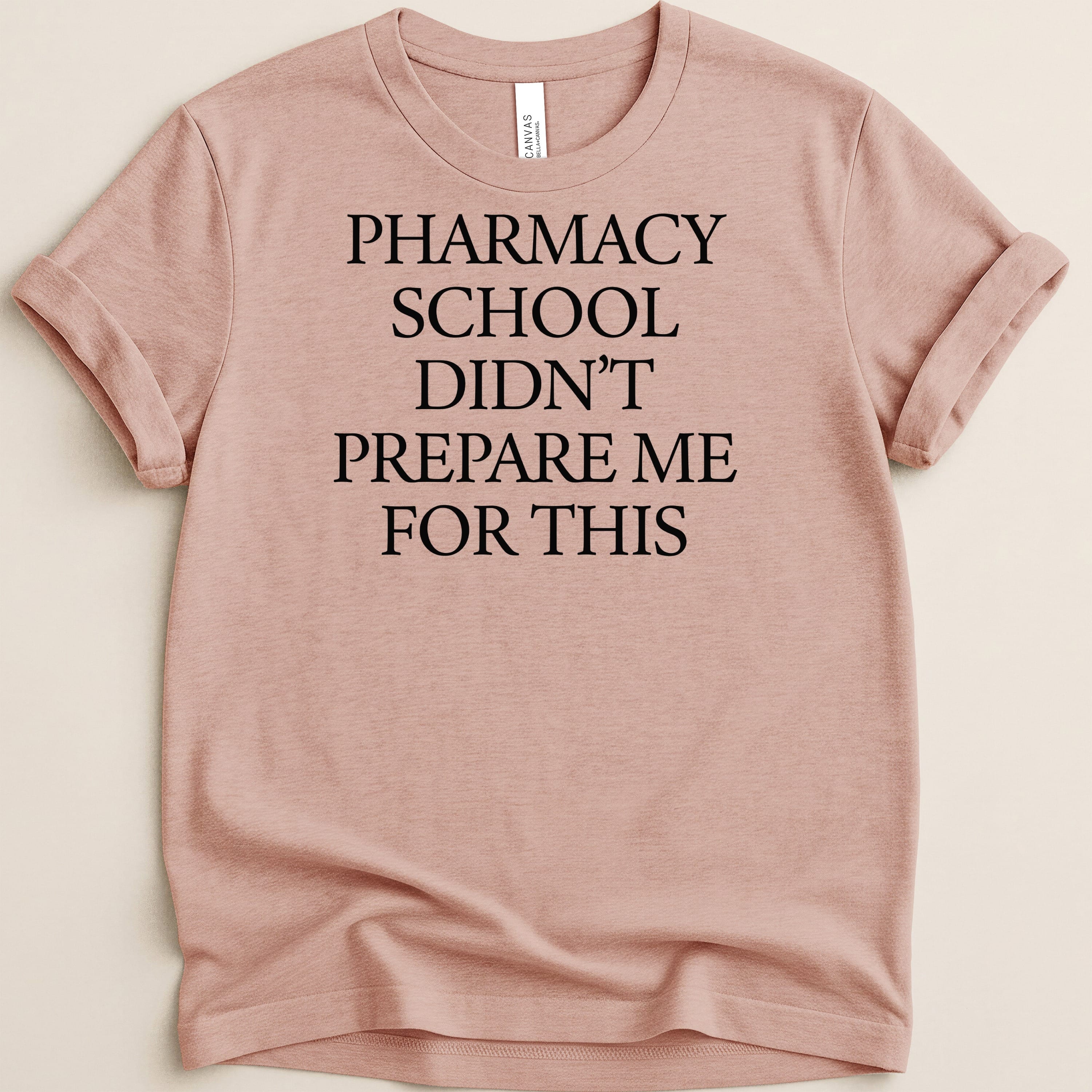 Pink t-shirt with "Pharmacy School Didn't Prepare Me For This" text.