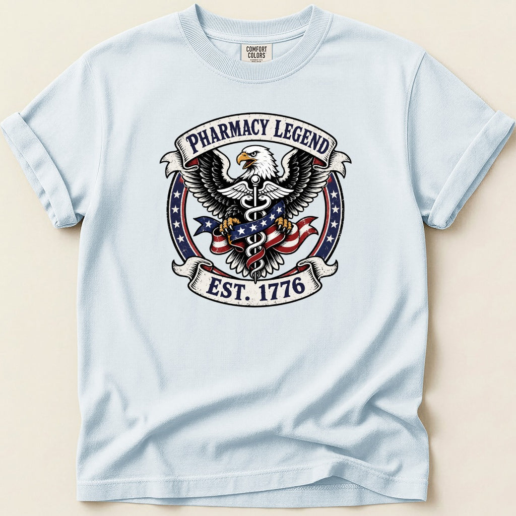 T-shirt with eagle, American flag, and "Pharmacy Legend Est. 1776" text.