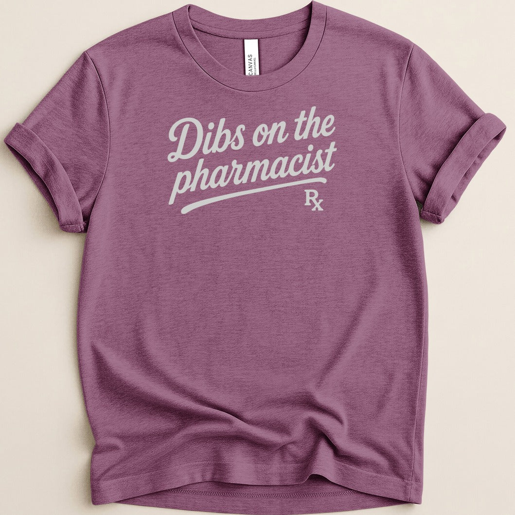 Purple t-shirt with "Dibs on the pharmacist" and "Rx" text in gray.