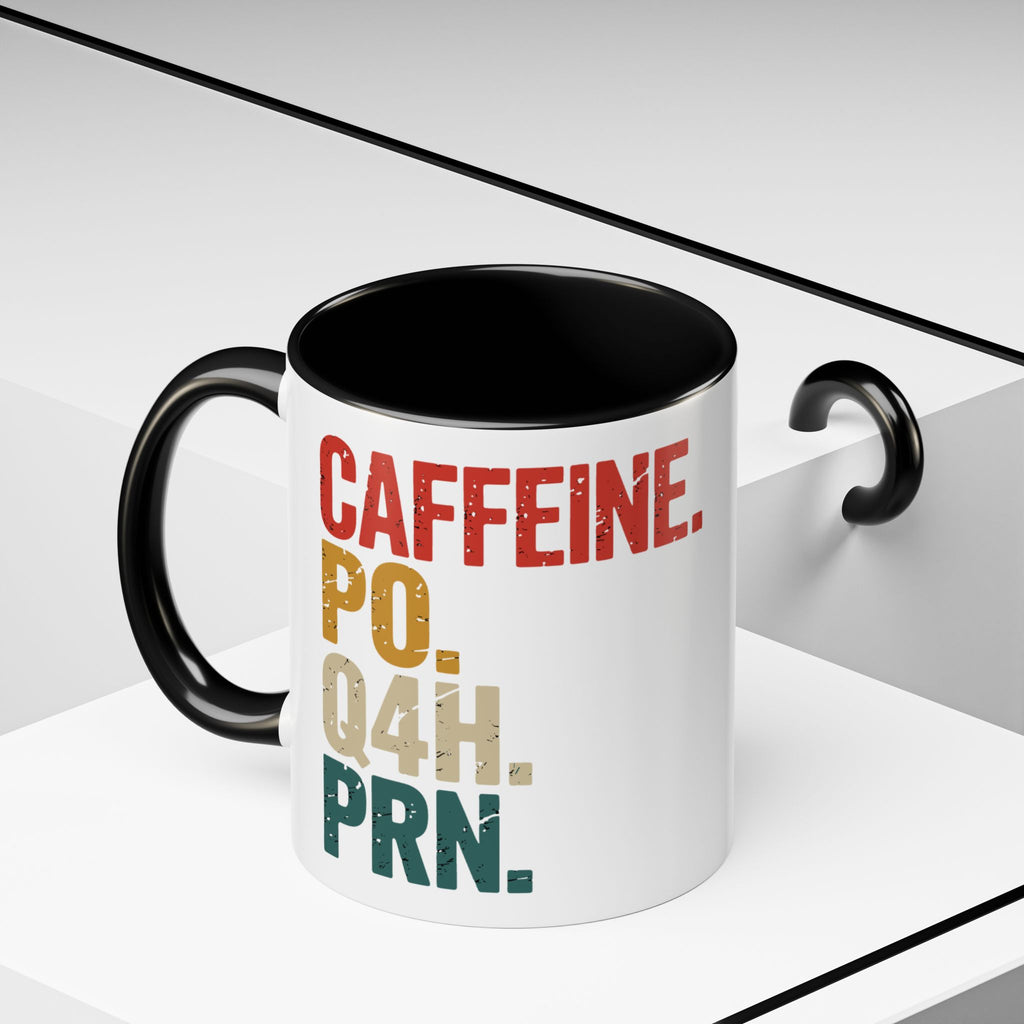 White mug with black interior and text "CAFFEINE PO Q4H PRN".