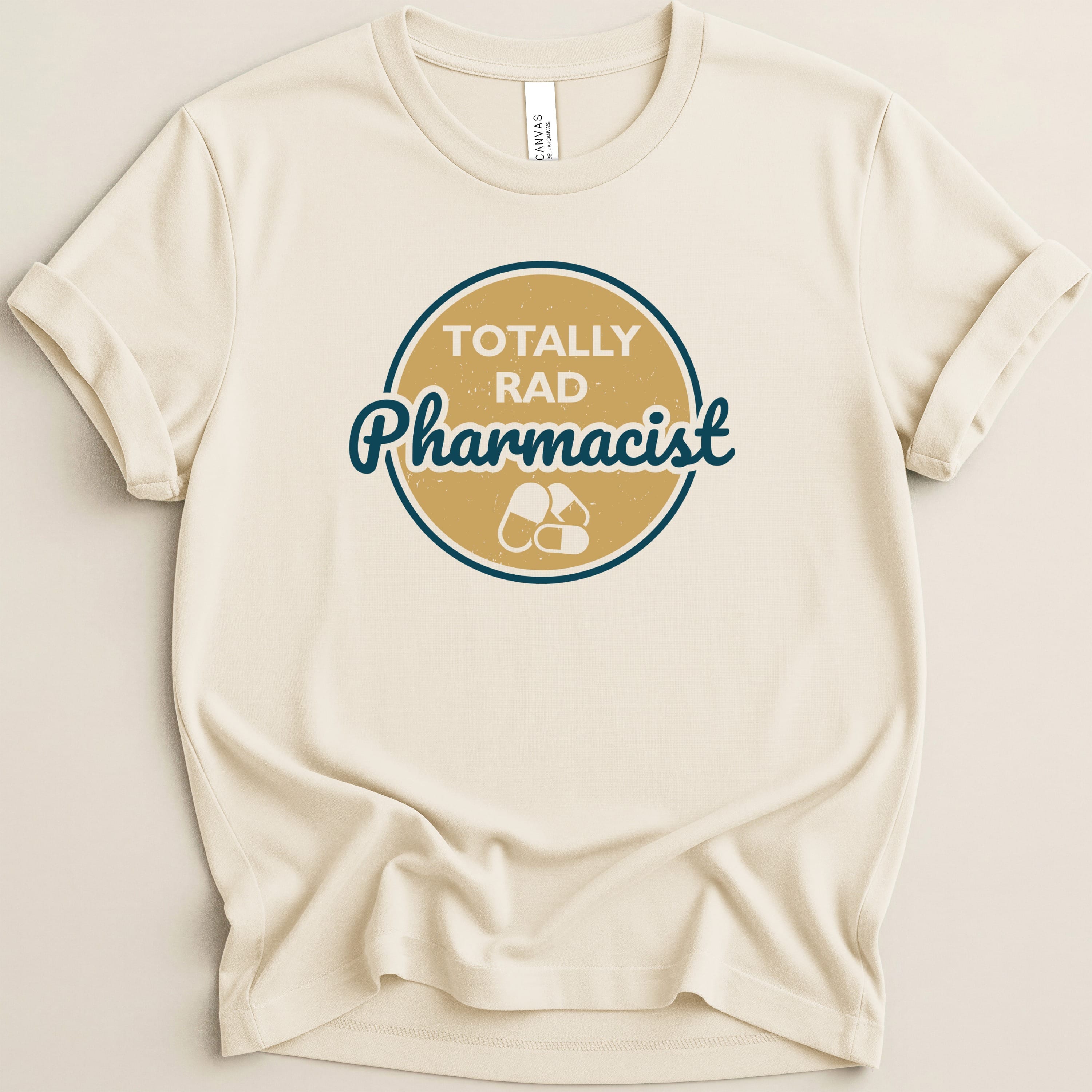 Cream t-shirt with "Totally Rad Pharmacist" text and pill graphic.