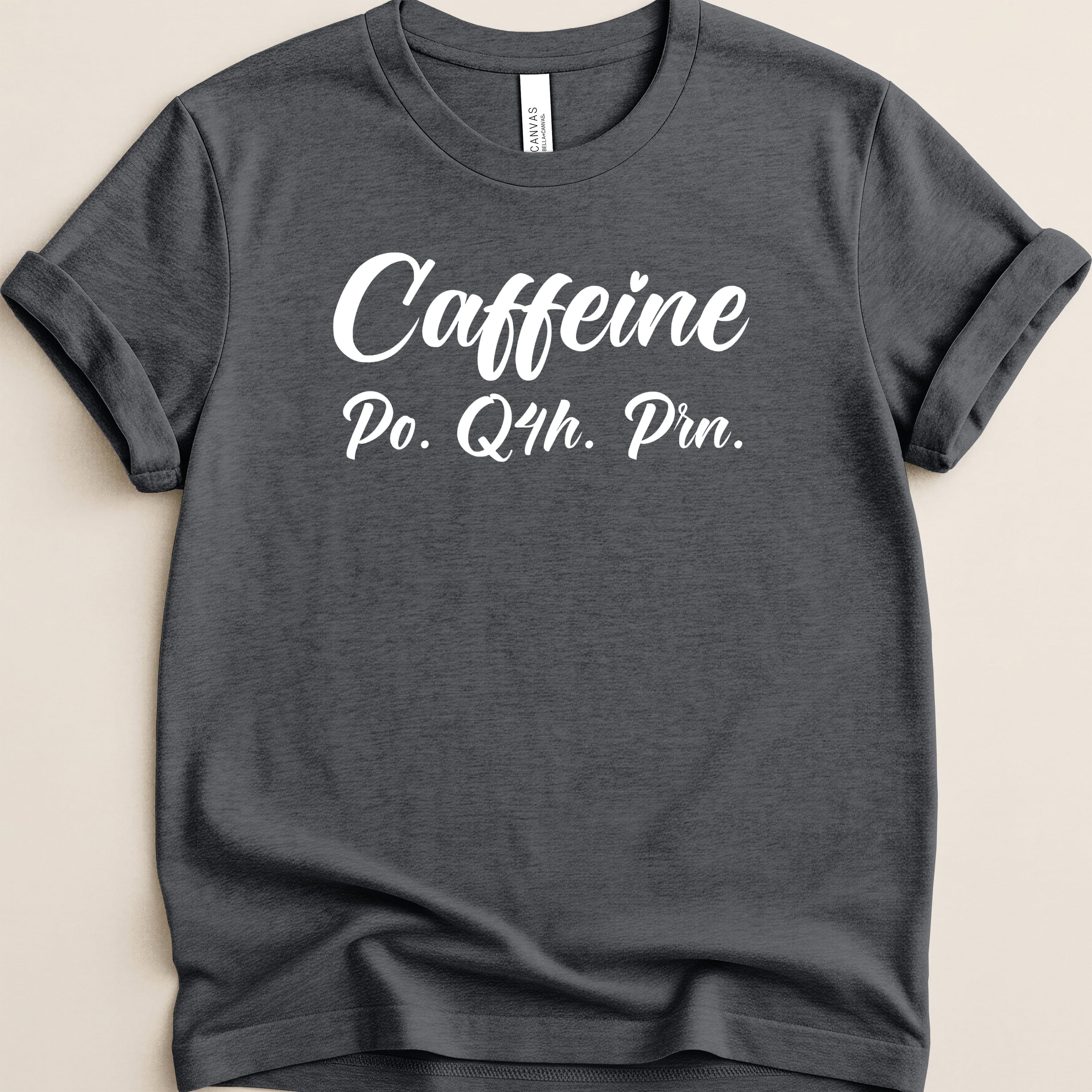 Charcoal grey t-shirt with "Caffeine Po. Qth. Prn." text in white script.