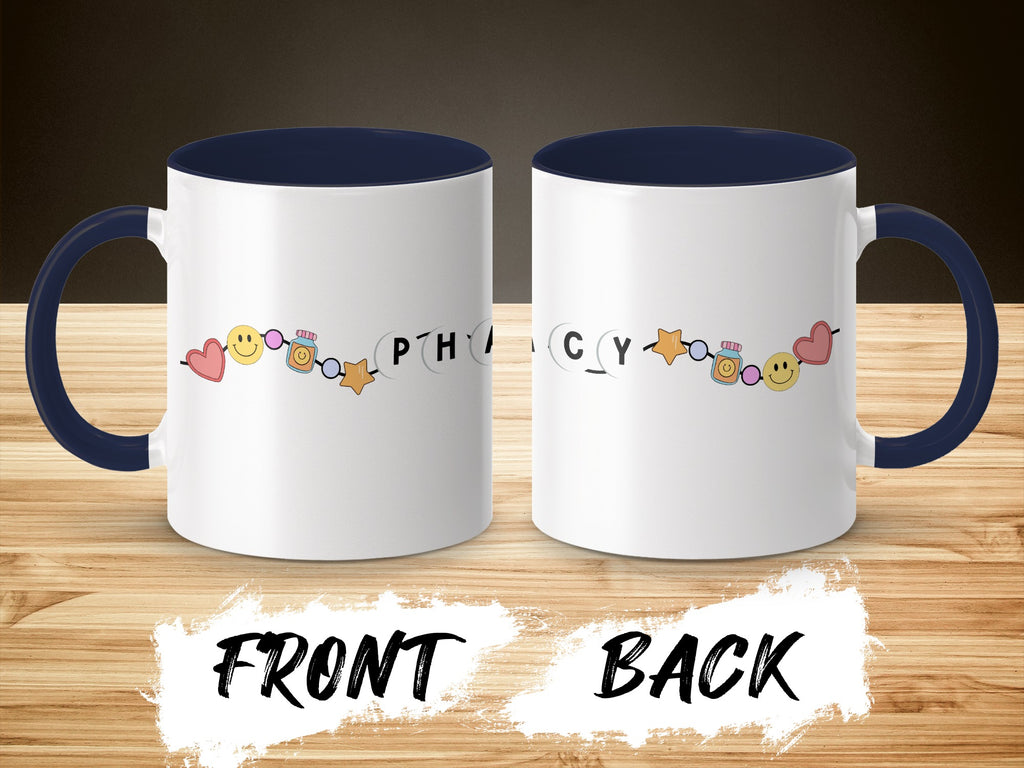 Two mugs with "PHYSICCY" text and colorful cartoon charms on navy handles.