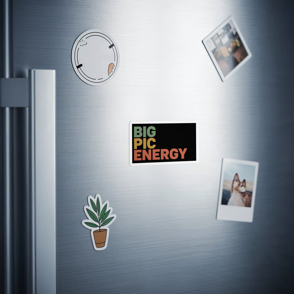 Rectangular magnet with "BIG PIC ENERGY" in colorful block letters on a refrigerator.