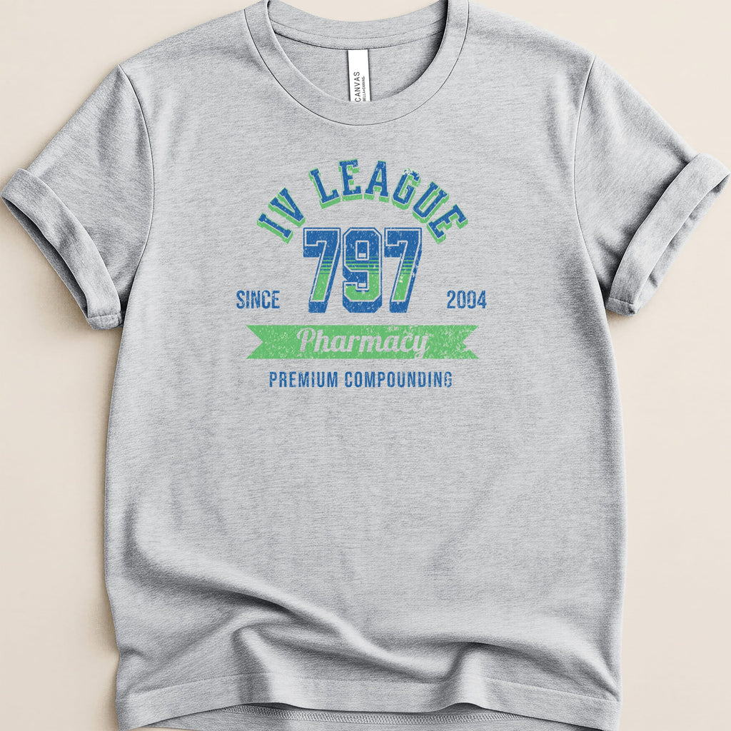 Grey t-shirt with "IV LEAGUE 797 Pharmacy PREMIUM COMPOUNDING" text.