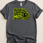 Dark gray t-shirt with fluorescent yellow text and smiley face graphic.