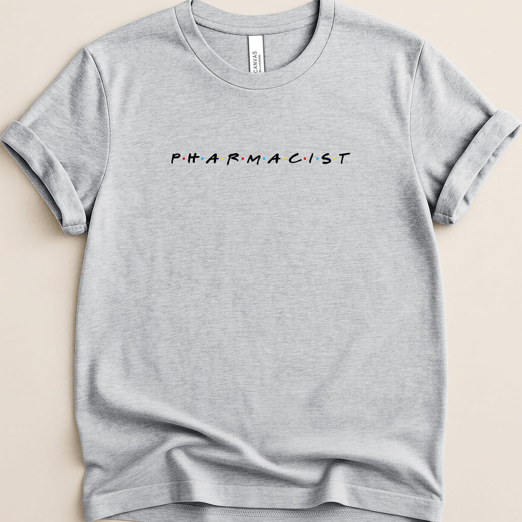 Grey t-shirt with "PHARMACIST" in colorful, spaced-out block letters.