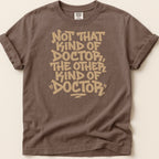 Brown t-shirt with "Not that kind of doctor, the other kind of 'Doctor'" in tan text.