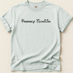 Light blue t-shirt with "Pharmacy Technician" text in black script.