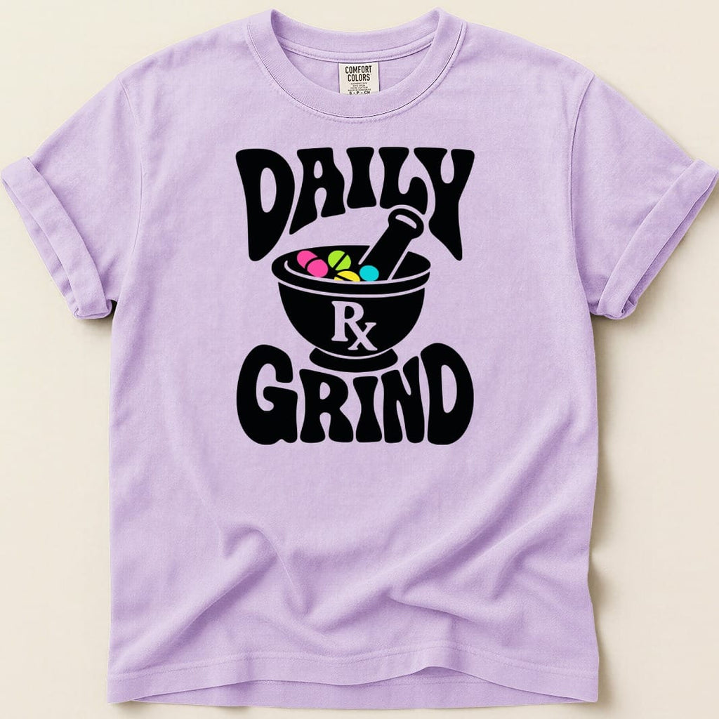 Purple t-shirt with "Daily Rx Grind" text and mortar and pestle graphic.