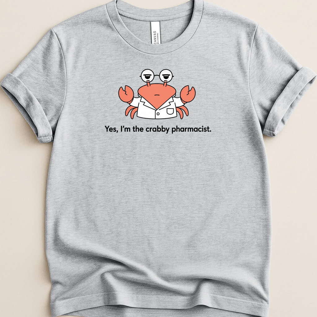 Gray t-shirt with a cartoon crab wearing glasses and a lab coat saying "Yes, I'm the crabby pharmacist."