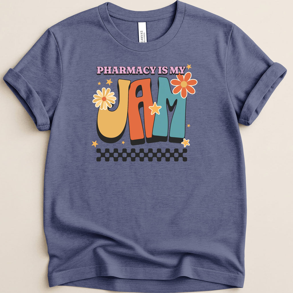 T-shirt with "Pharmacy is my jam" text, colorful lettering, and floral accents.