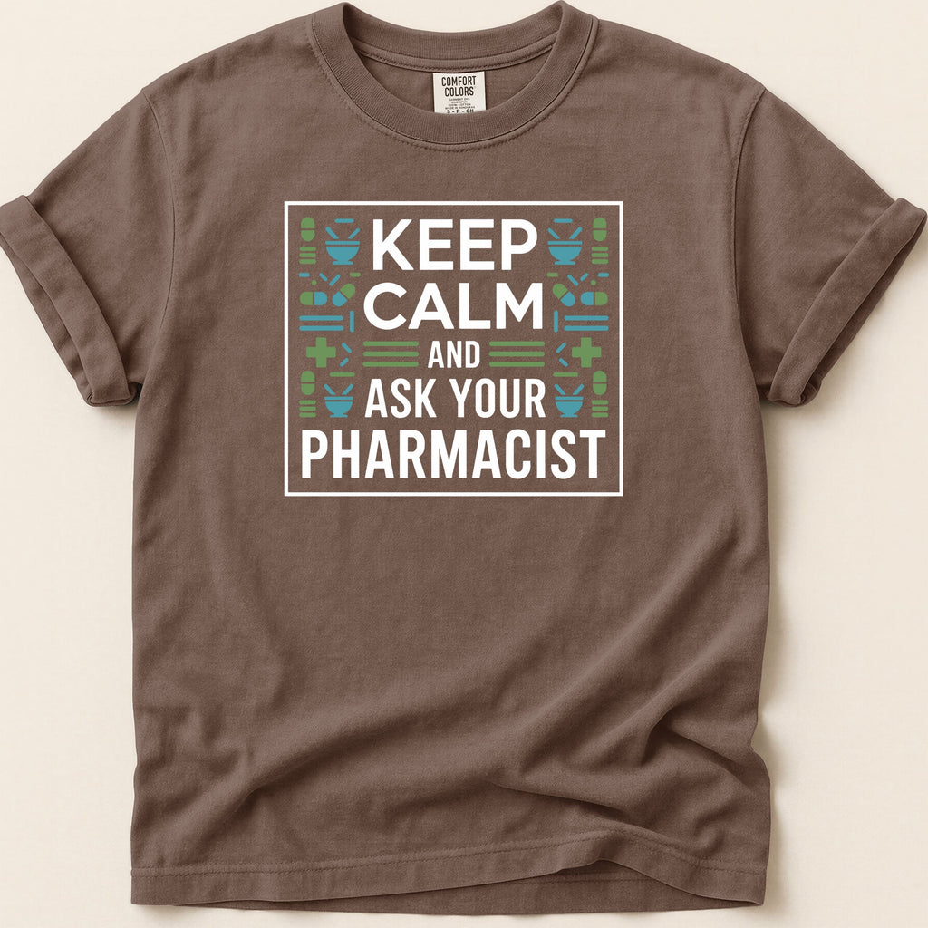 Brown t-shirt with "KEEP CALM AND ASK YOUR PHARMACIST" text and pharmacy symbols.