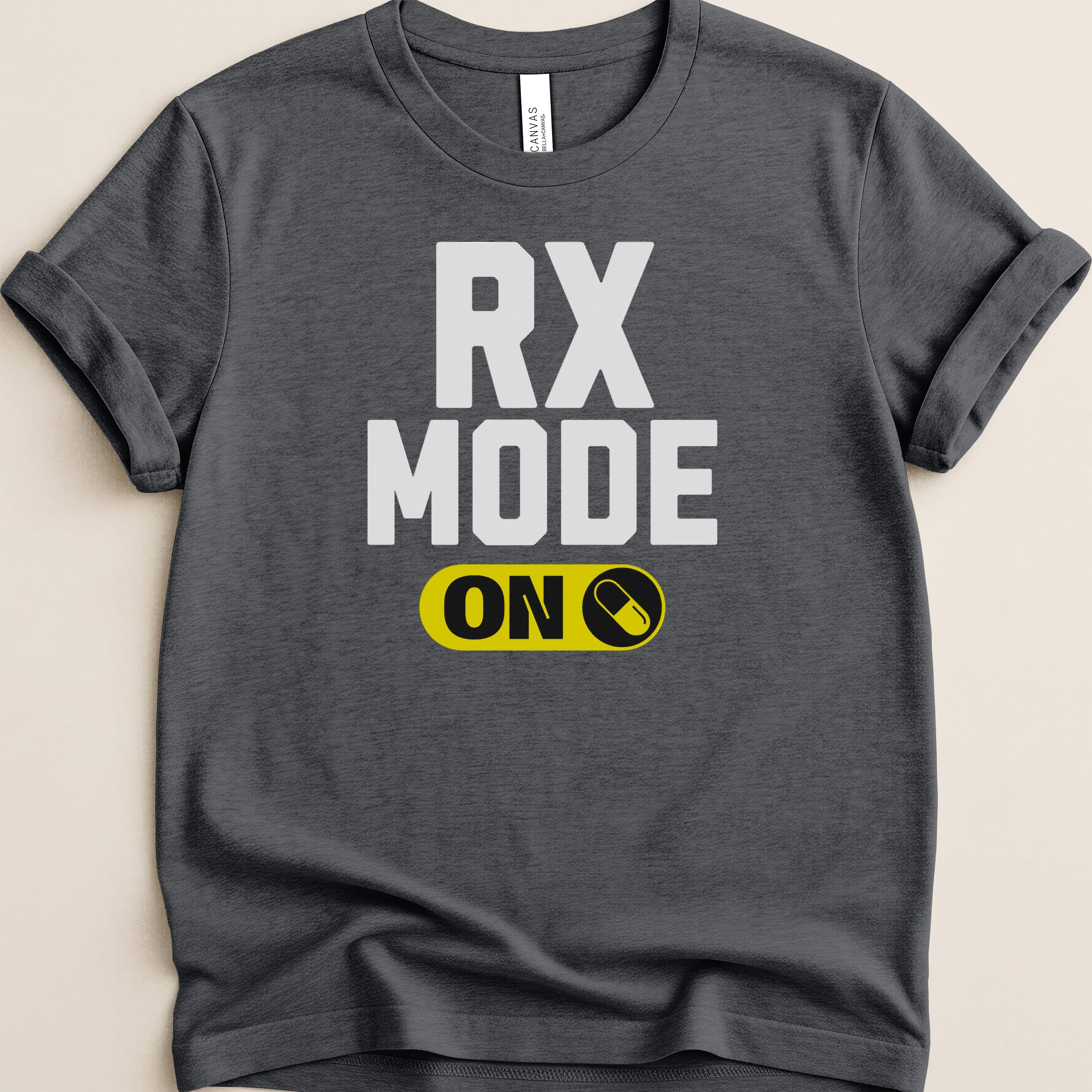 Dark grey t-shirt with "RX MODE ON" and a pill icon.