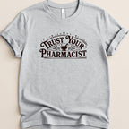 Gray t-shirt with "Trust Your Pharmacist" text and mortar and pestle graphic.