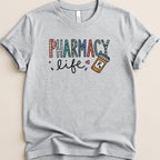 Gray t-shirt with "Pharmacy Life" text and a prescription bottle.