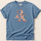 Distressed American flag RX symbol on a blue t-shirt.