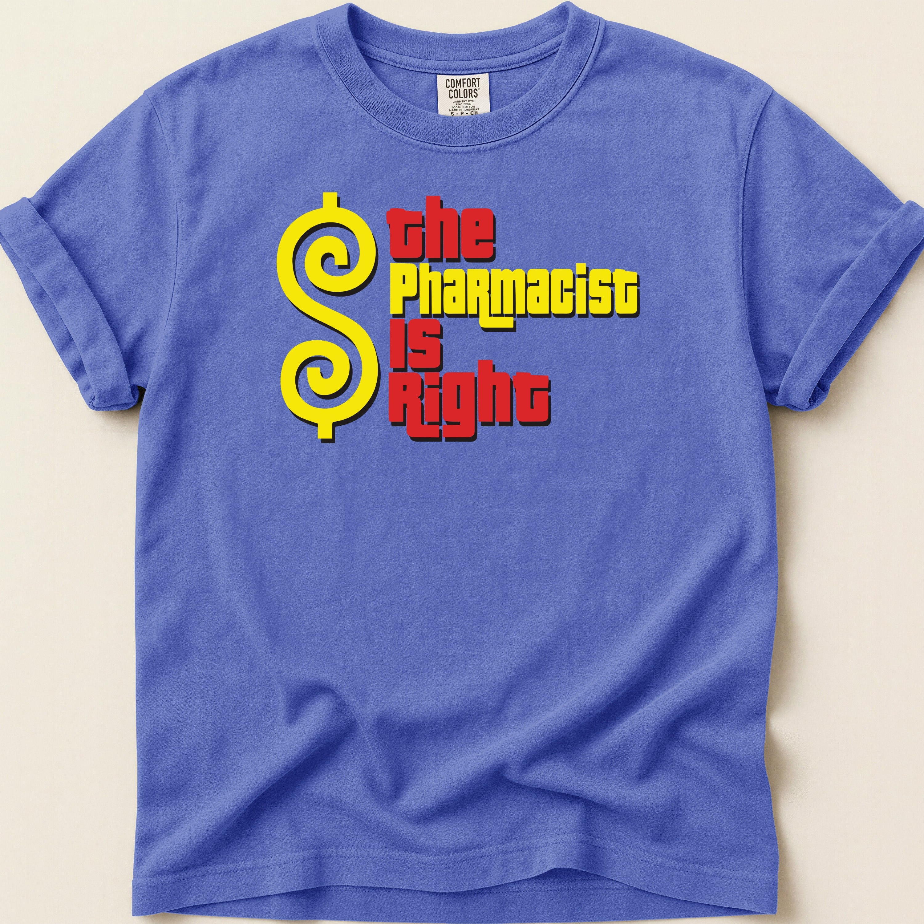 Purple t-shirt with yellow dollar sign and red text that reads "The Pharmacist Is Right."
