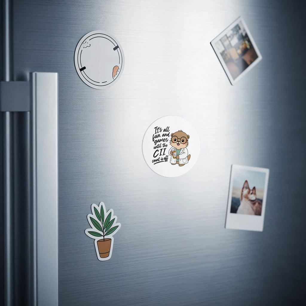 Round magnet with a cartoon otter wearing glasses and holding a beaker.
