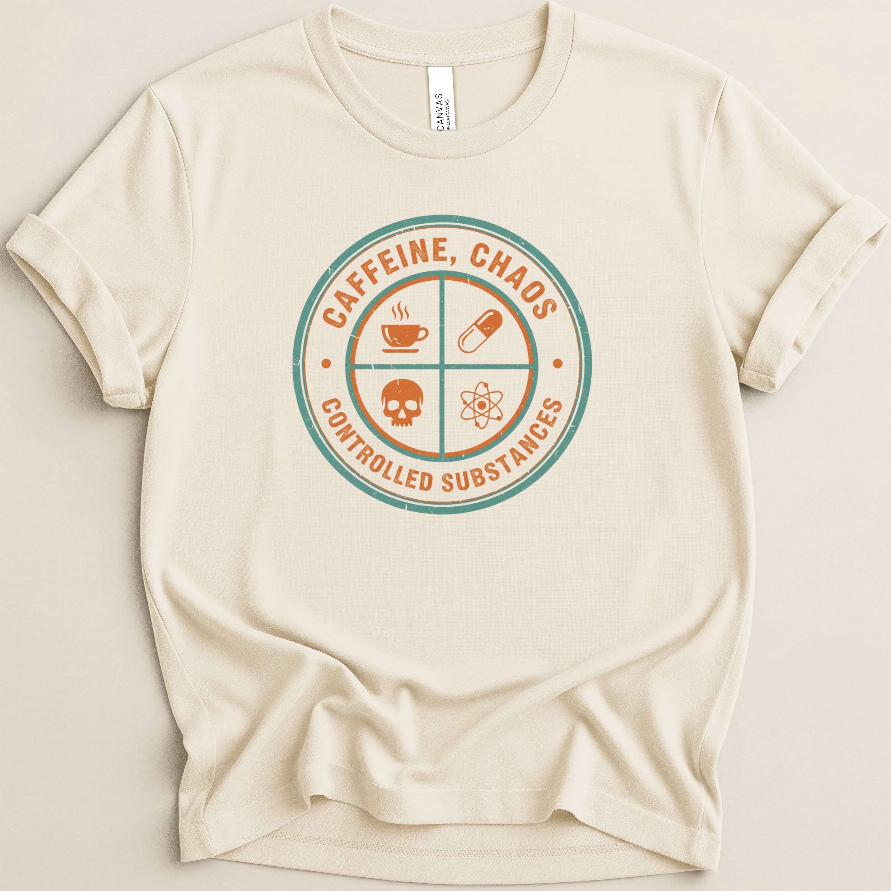 Cream t-shirt with circular graphic featuring text and icons.