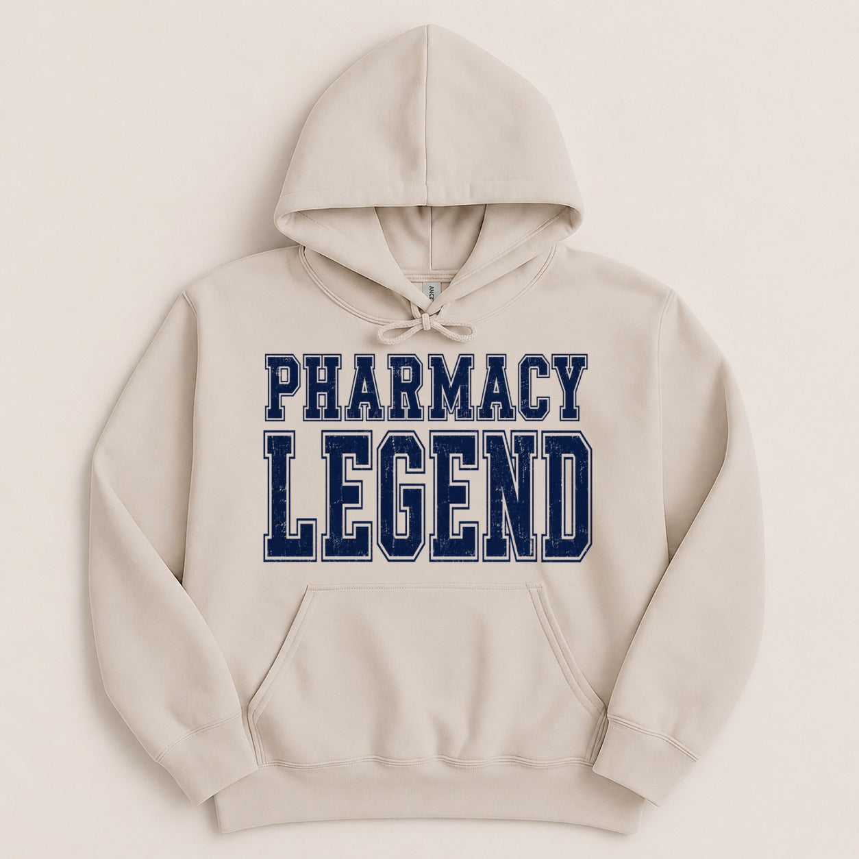 Cream hoodie with navy blue "Pharmacy Legend" text.