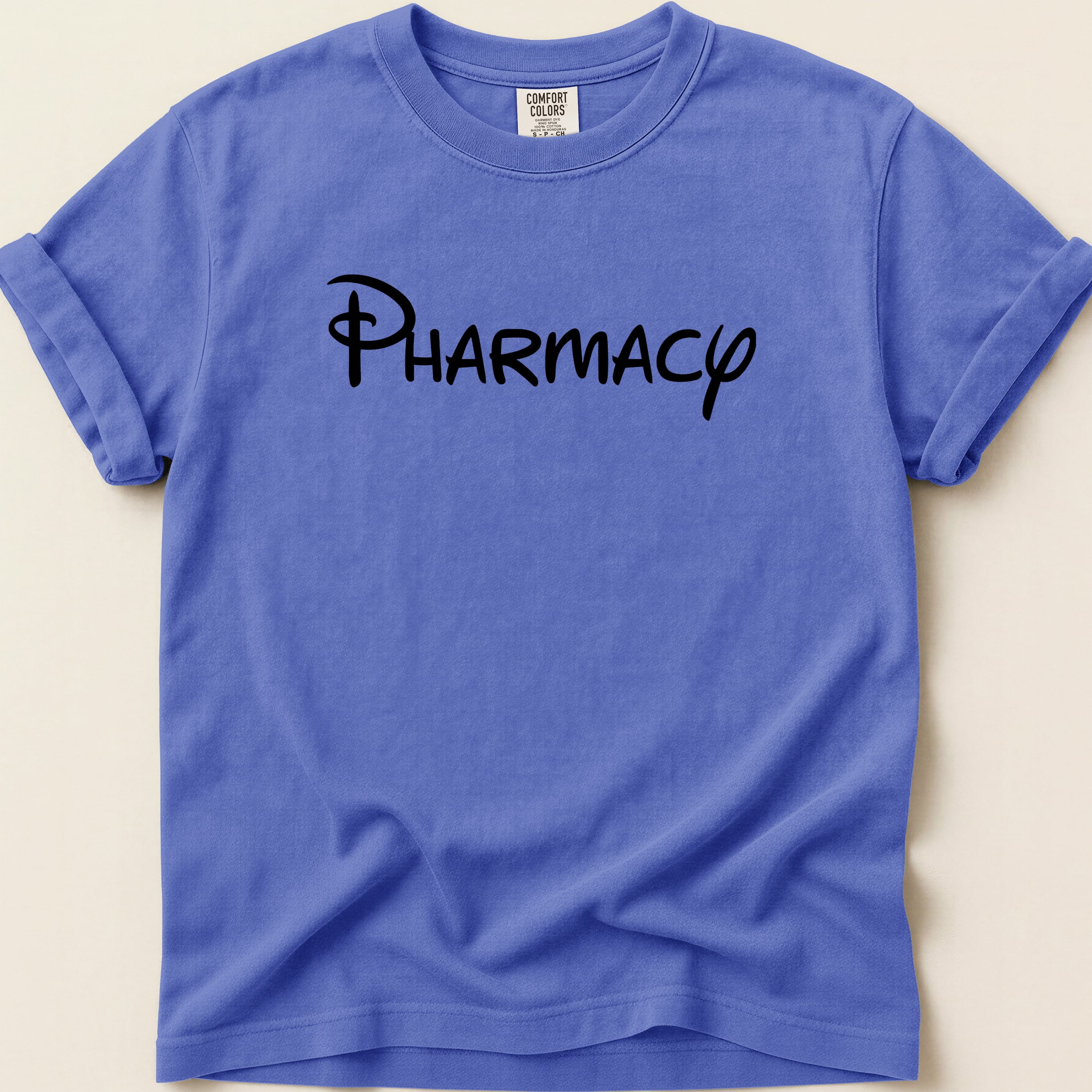 Purple Comfort Colors t-shirt with "PHARMACY" in black script text.
