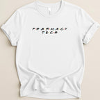 White t-shirt with "Pharmacy Tech" in colorful Friends-style font.