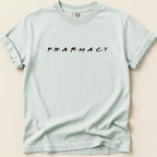 Light blue t-shirt with "PHARMACY" in colored dot letters.