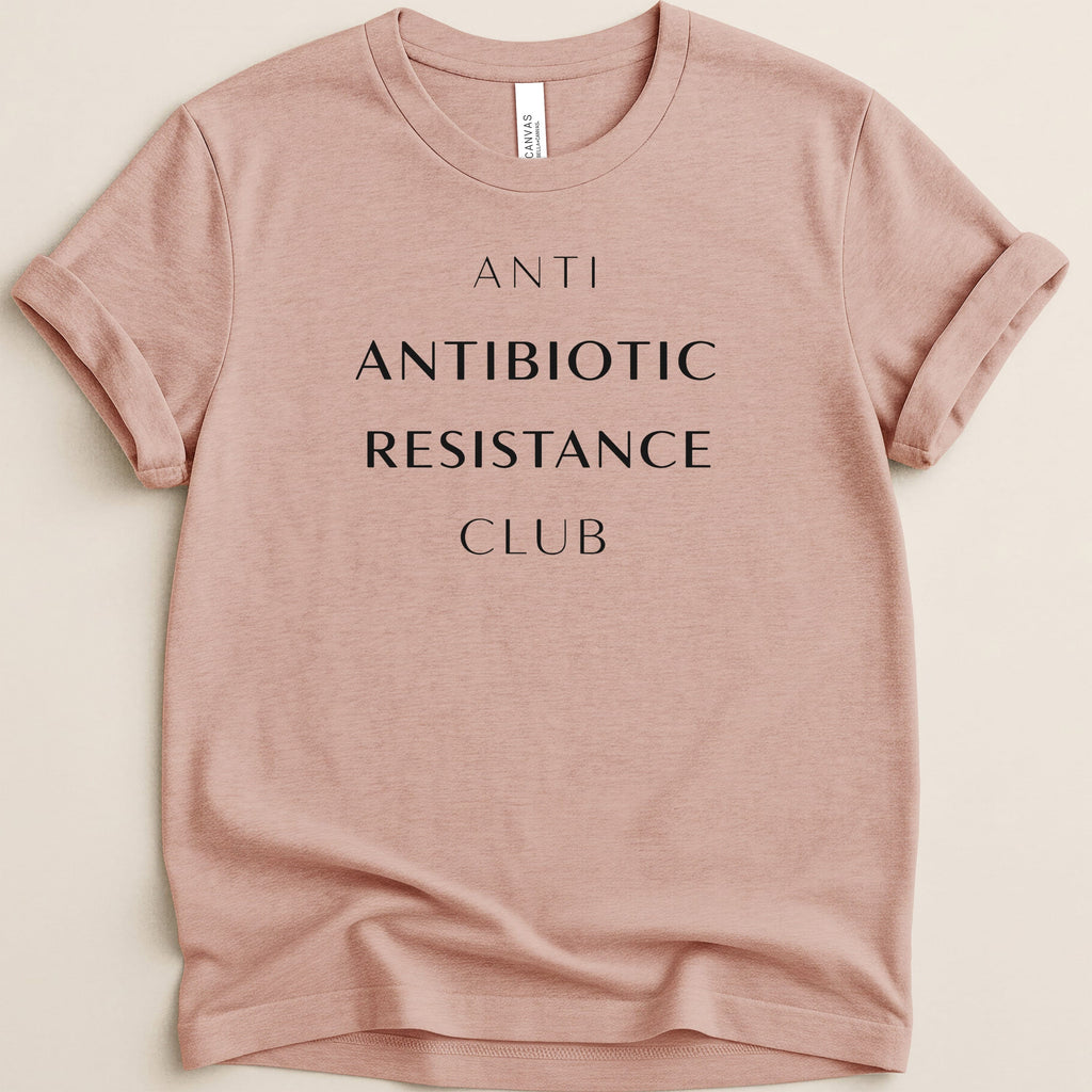 Pink t-shirt with "ANTI ANTIBIOTIC RESISTANCE CLUB" text.