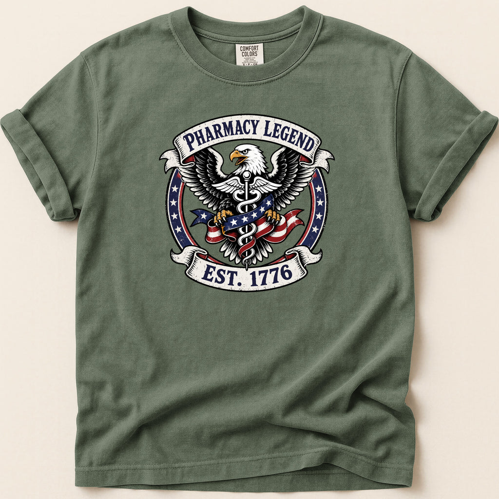Green t-shirt with Pharmacy Legend Est. 1776 eagle emblem.