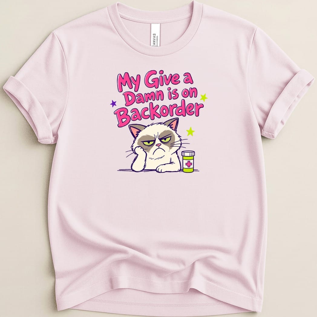 Pink t-shirt with text "My Give a Damn is on Backorder" and a grumpy cat.