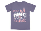 Purple t-shirt with "Every Bunny's Favorite Pharmacist" text and Easter graphics.
