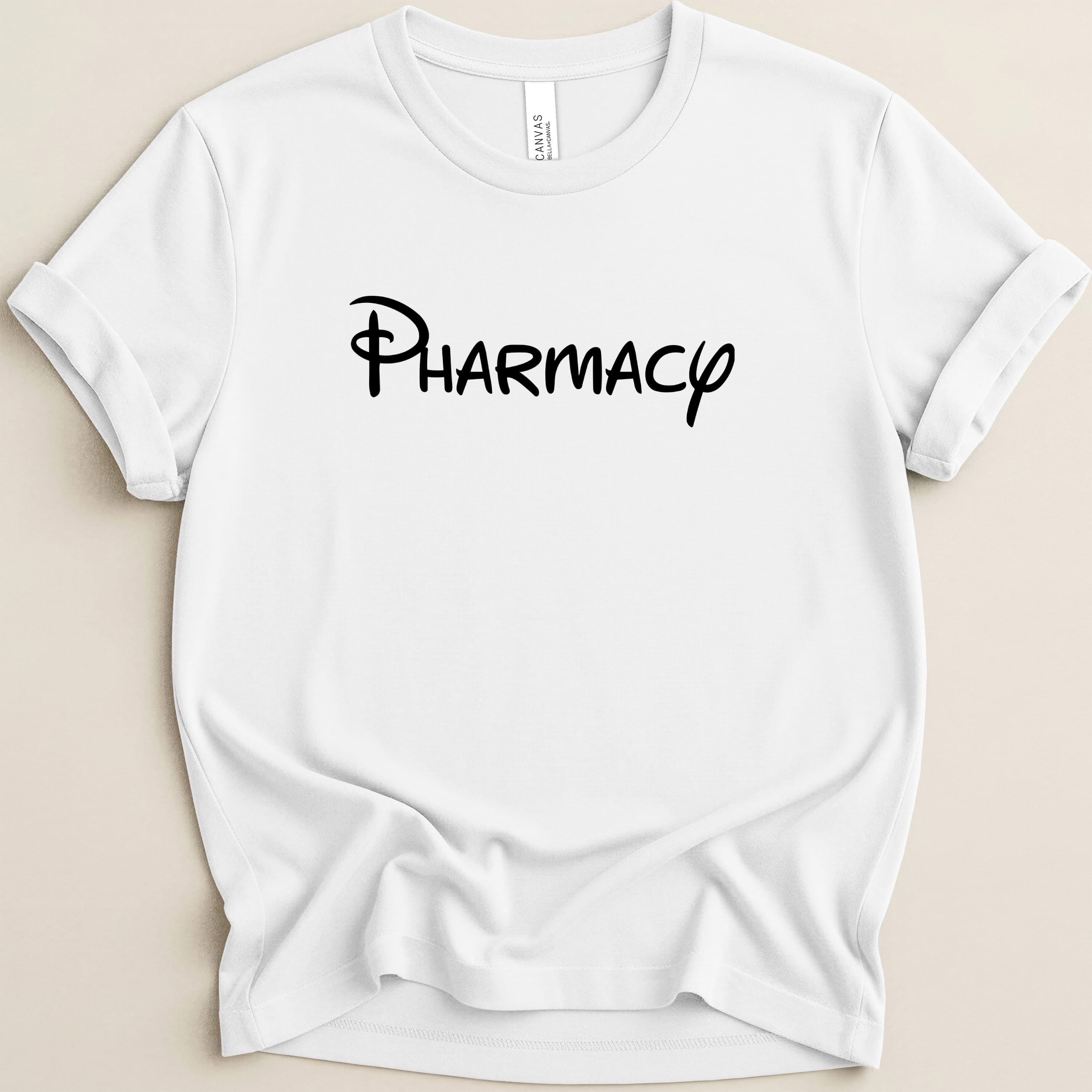 White t-shirt with "Pharmacy" in Disney-style font.