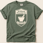 T-shirt featuring a crest with "William Procter Jr. FAN CLUB" and a mortar and pestle.