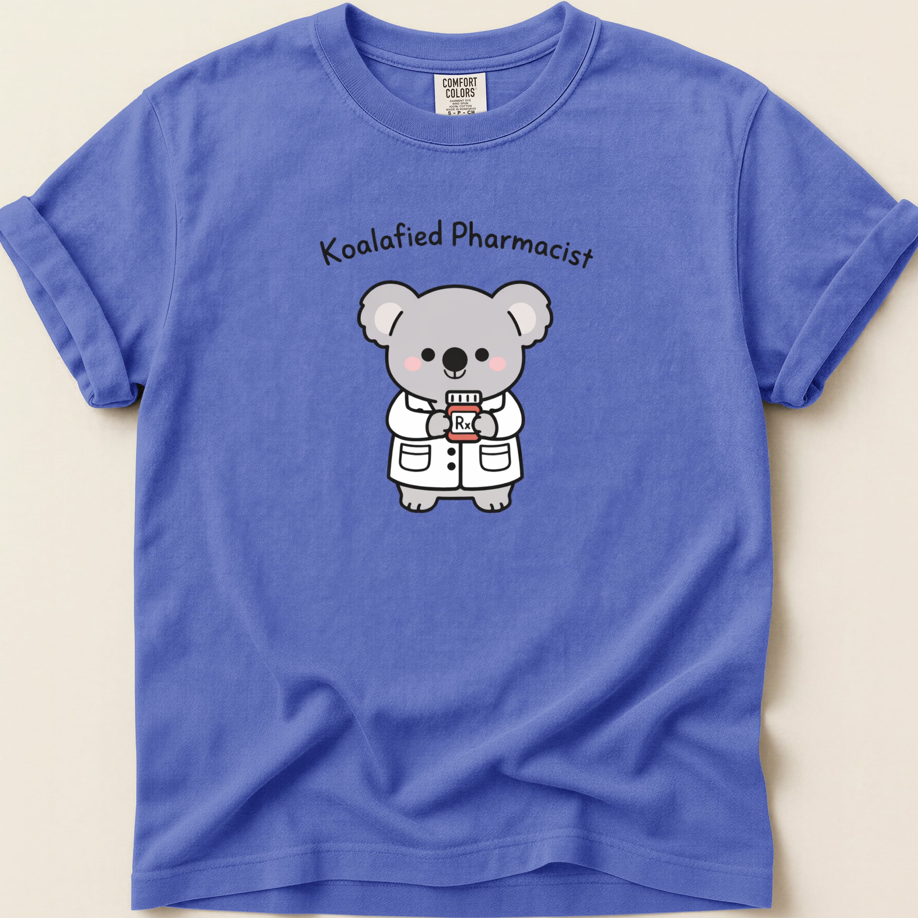 T-shirt with a cartoon koala pharmacist holding a prescription bottle.