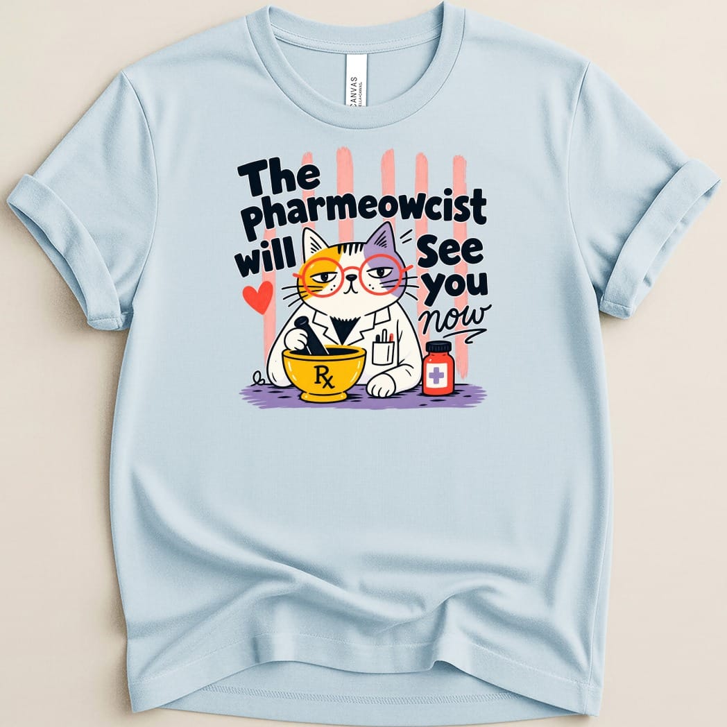 Light blue t-shirt with cat pharmacist, mortar, pestle, and Rx symbol.