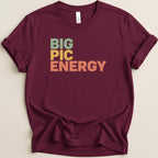 Maroon t-shirt with "BIG PIC ENERGY" in colorful block letters.