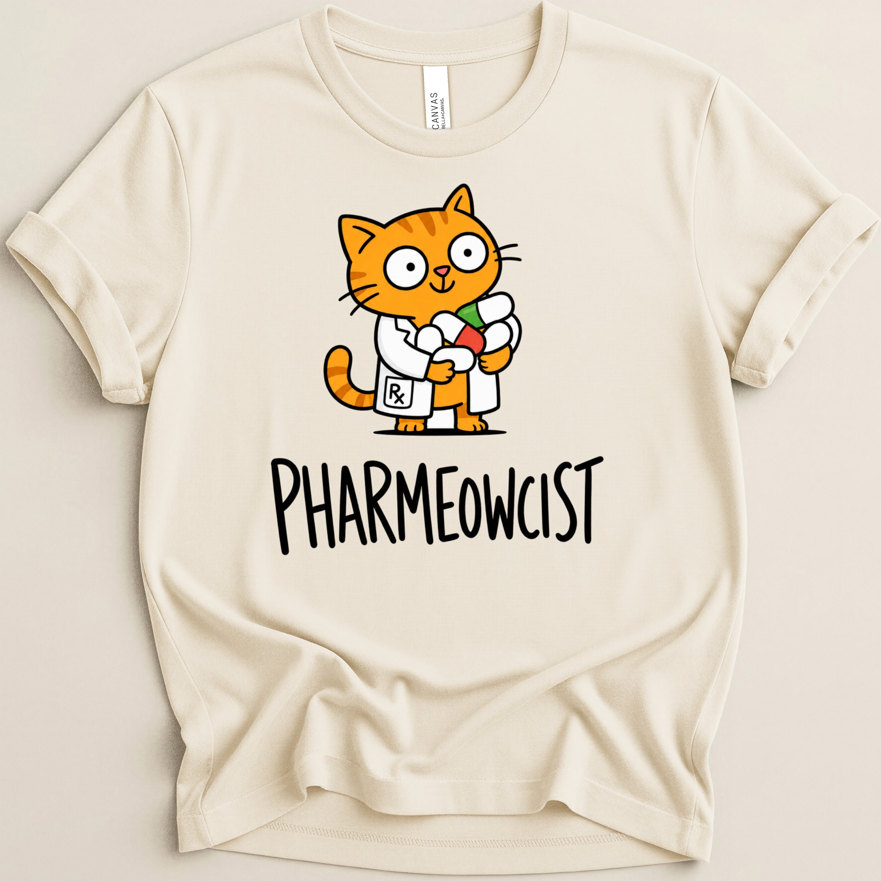 Cream t-shirt with cartoon orange cat in lab coat holding pills, text "PHARMEOWCIST".