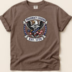 Brown t-shirt with Pharmacy Legend EST. 1776 eagle emblem.